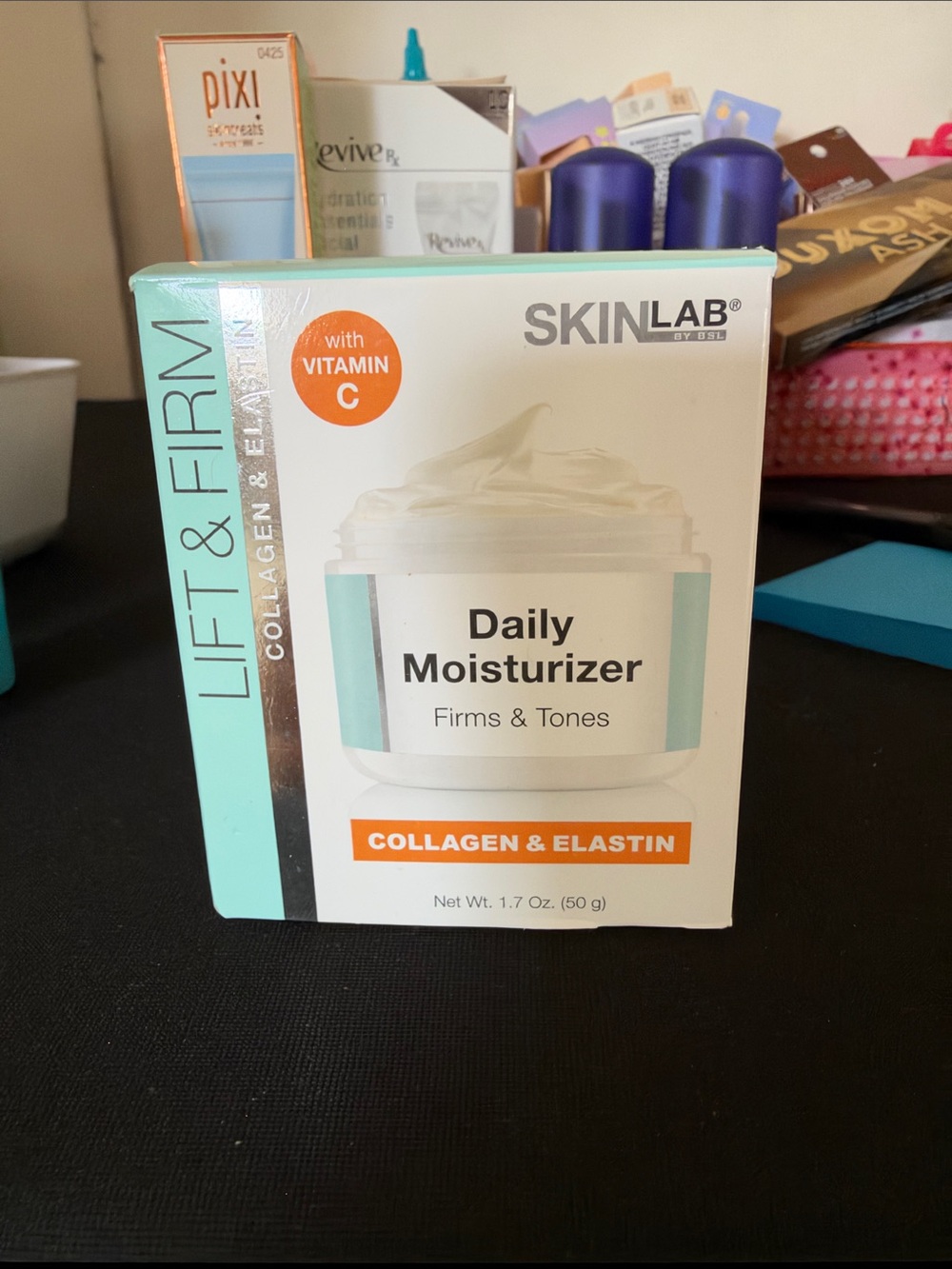 SkinLab Daily Moisturizer - Light Teal, White & Orange Accents